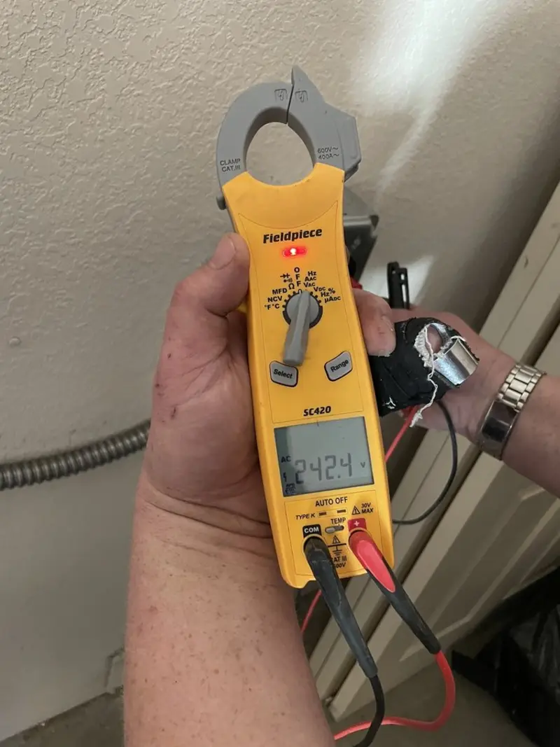 Voltage testing with clamp meter during Electrical Installation Services in Souderton